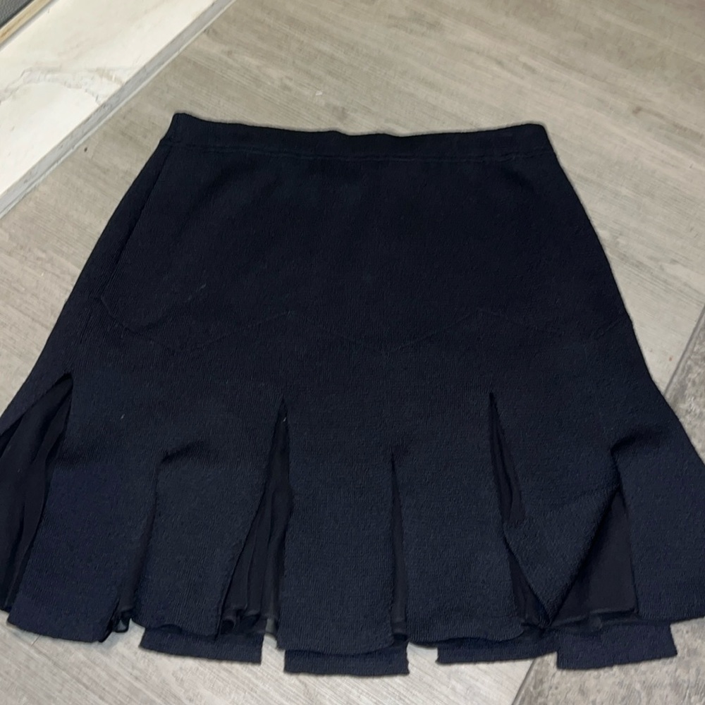 Rare St. John Pleaded flown skirt.